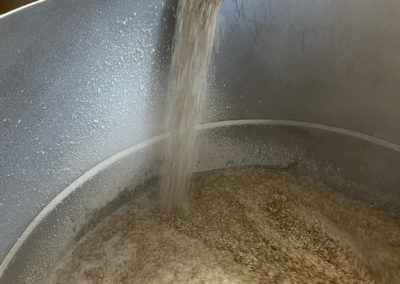 Milled grain entering mash tun